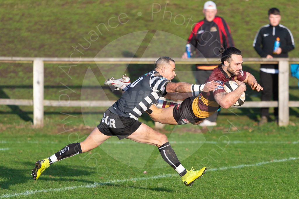 Sam Baker takes Ampthill ahead.